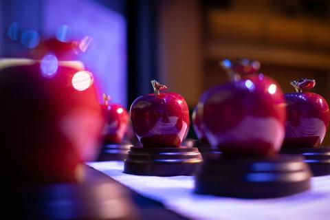 Apple trophies for Teacher of the Year finalists.