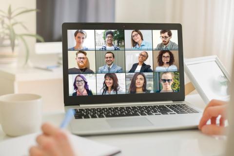 People participating in Zoom meeting photo.